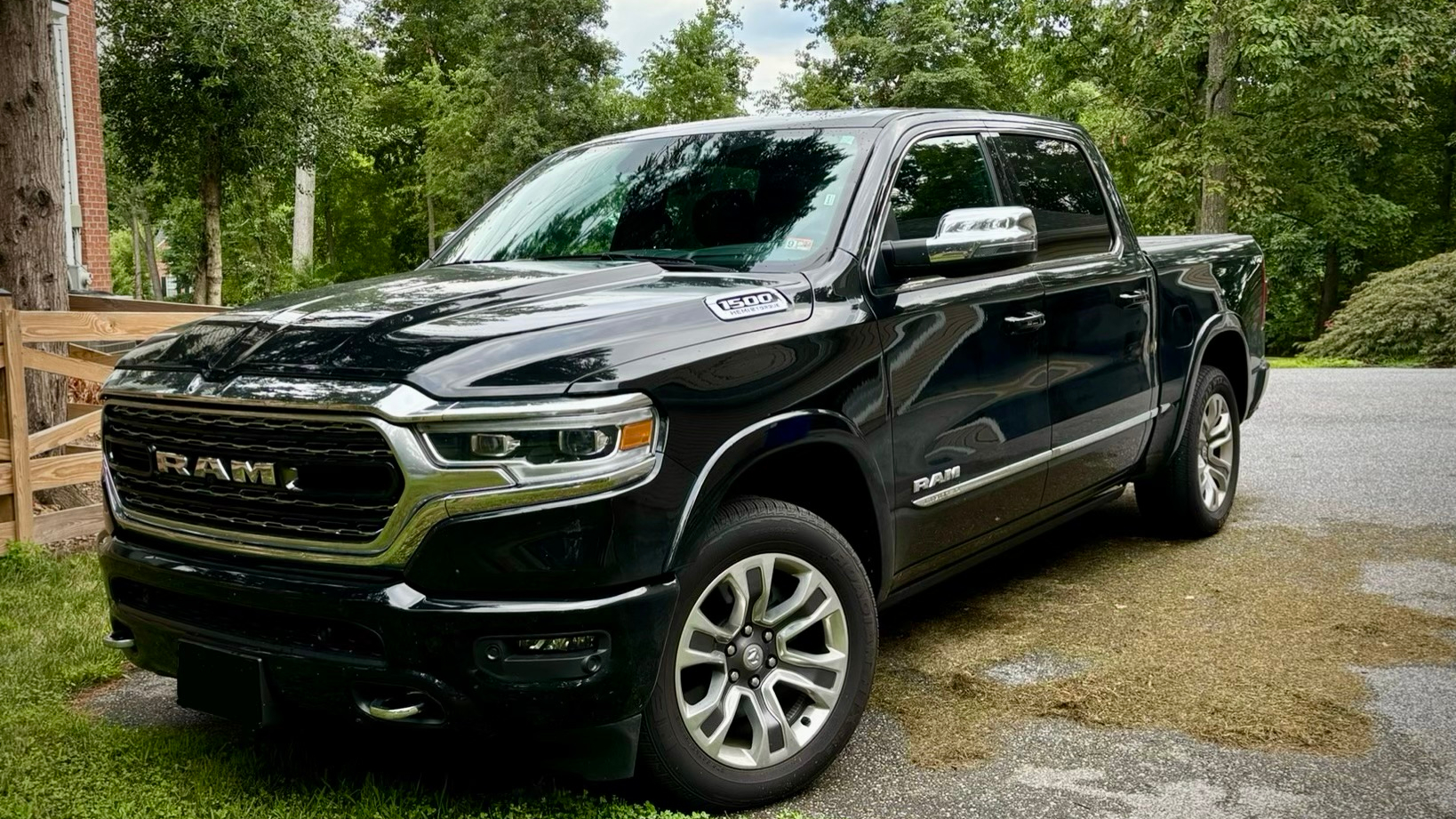 black dodge ram after detailing in a driveway