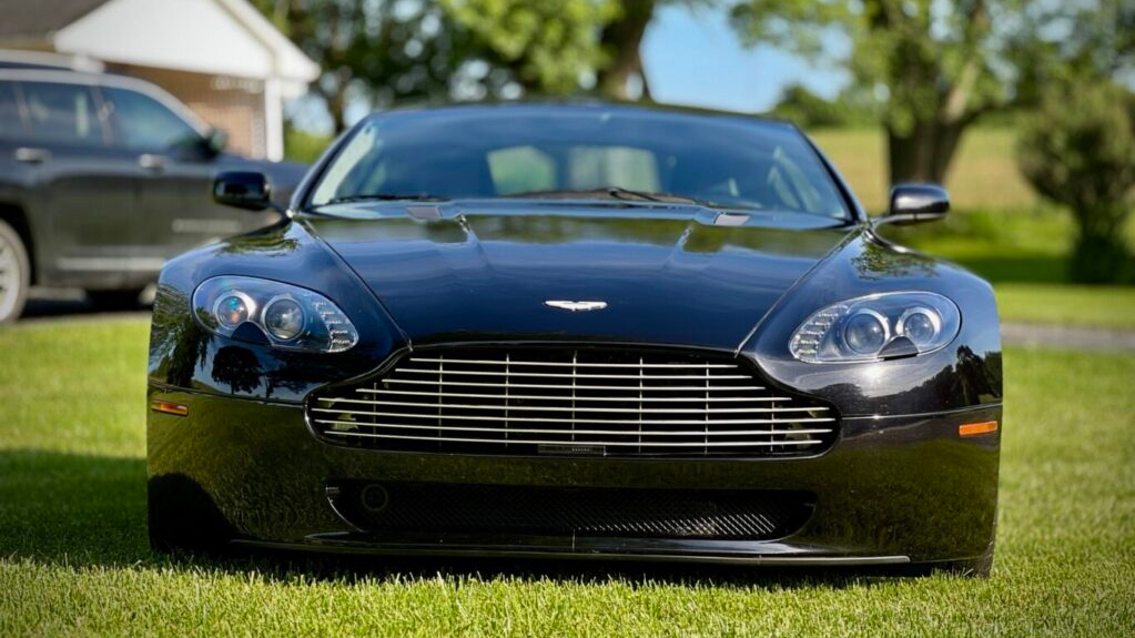 Freshly detailed Aston Martin in the grass