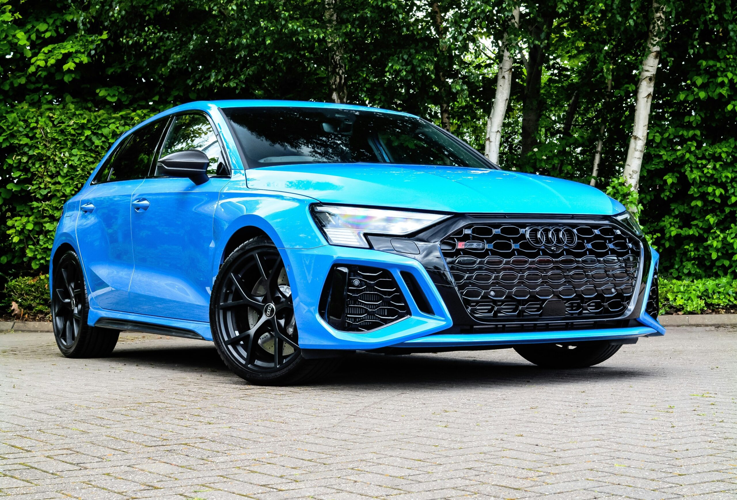 blue audi in driveway